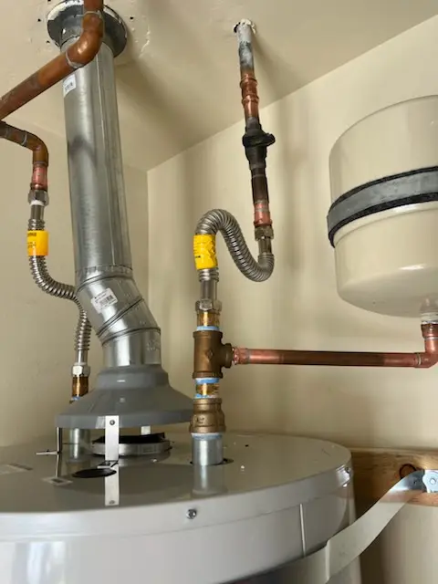 Water heater installation and plumbing repair in Towerville